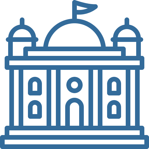 A blue building with a flag on top of it.